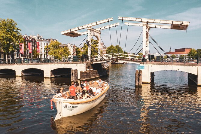 Amsterdam: Saloon Boat Cruise + Unlimited Drinks & Bite option - The Amstel and Amsterdam’s origin story