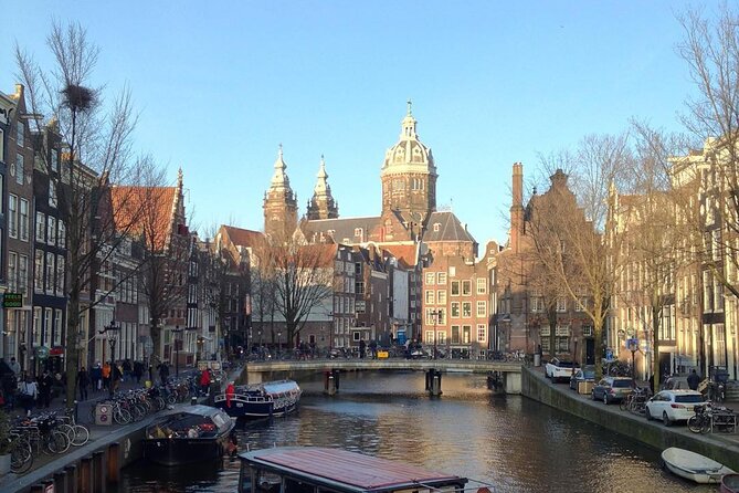 Amsterdam Sightseeing Tour + Hidden Gems + Tastings + PDF guide - Tuschinski cinema and Amsterdam’s flair for design