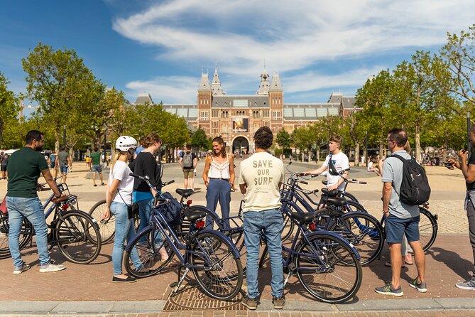 Amsterdam Small-Group Bike Tour With Canal Cruise, Drinks, Cheese - Crossing Amsterdam’s narrowest bridge