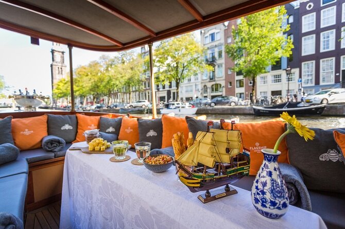 Amsterdam Small-Group Bike Tour With Canal Cruise, Drinks, Cheese - Riding pace, safety, and fitness