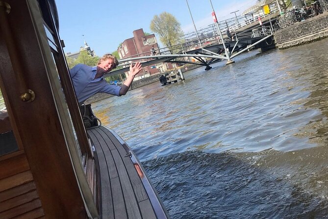 Amsterdam small-group canal cruise in 1920s saloon boat - Why this old saloon boat changes the ride