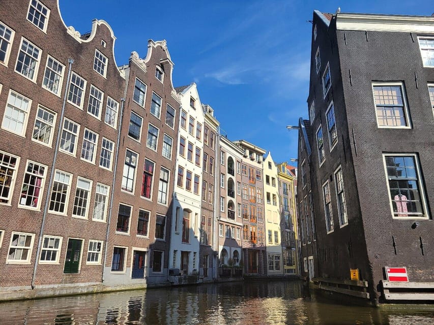 Amsterdam: Small-Group Canal Cruise incl. Drinks and Snacks - Snacks, drinks, and what $85 really covers