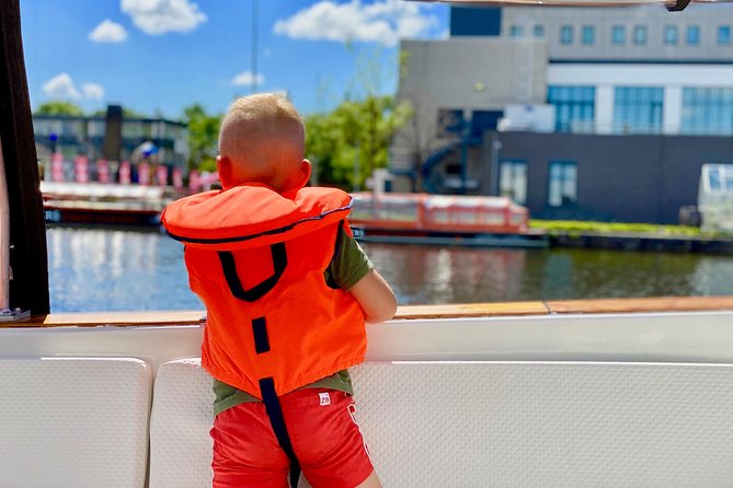 Amsterdam Small-Group Canal Cruise Including Snacks and Drinks - Maritime Museum, Golden Age ship, and Hortus Botanicus