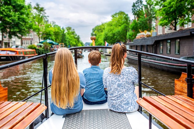 Amsterdam Small-Group Canal Cruise With Dutch Snacks and Drink - The old center, flea market, and maritime district