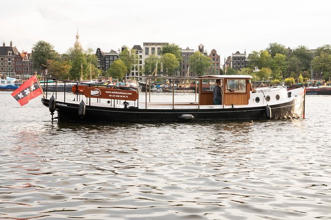 Amsterdam Small-Group Canal Cruise With Dutch Snacks and Drink - The Jordaan, Amsterdam’s long canals, and the Anne Frank House