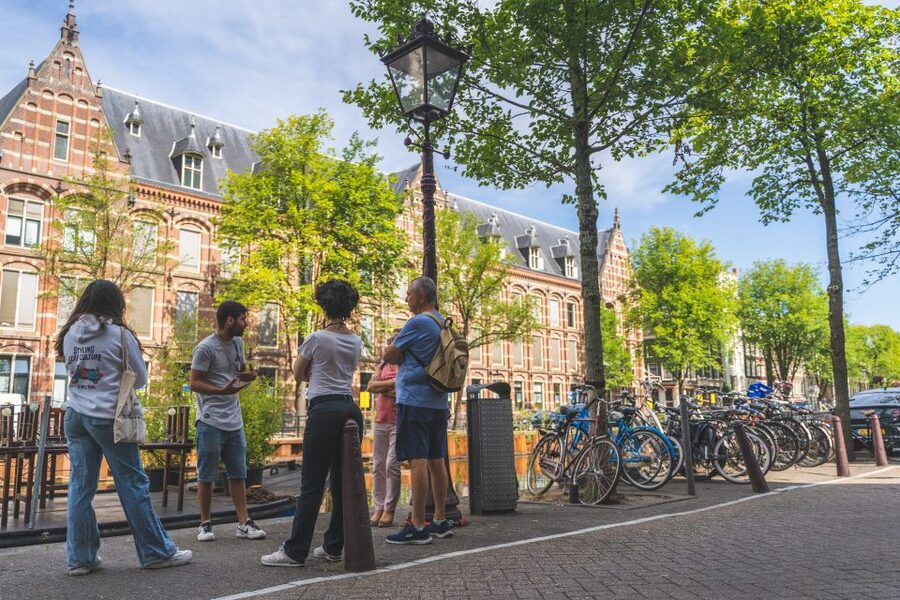 Amsterdam Small-Group Walking Tour - Flower Market and Muntplein: finishing among canals and commerce