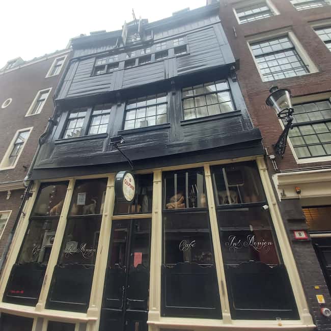 Amsterdam: Spanish Tour Unmasking the Redlight District - Finishing near Beursplein and Dam Square