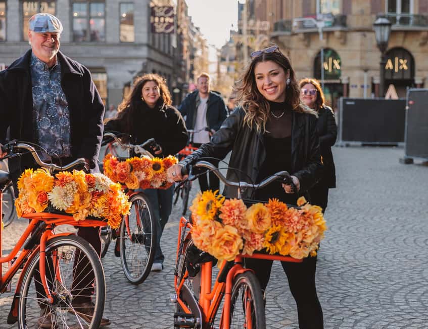 Amsterdam: Top Highlights Guided Bike Tour EN/DE/ES/FR/IT/CN - Canal scenery, the Nine Streets, and Dam Square