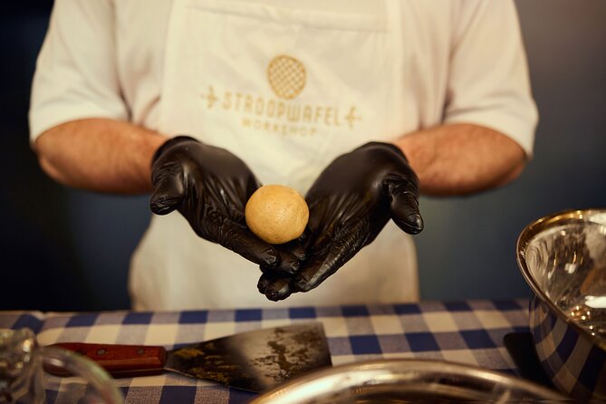 Amsterdam Traditional Dutch Syrup Waffle Making Workshop - Cooking the waffles on a hot iron