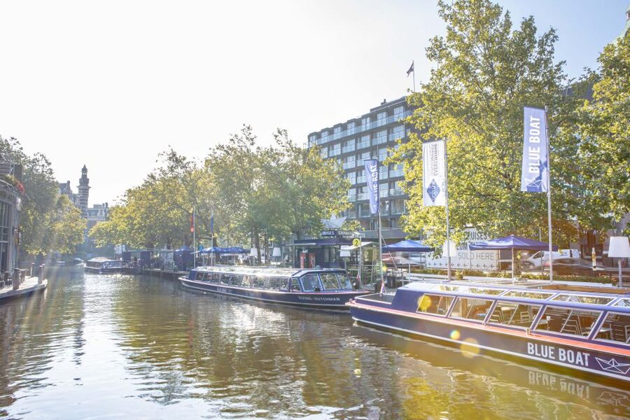 Amsterdam: Van Gogh Museum Ticket and City Canal Cruise - Boarding the open-ticket canal cruise