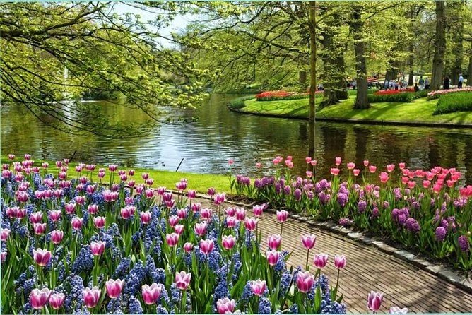 Day Trip to Keukenhof Gardens from Amsterdam with Tour Guide - Three hours among tulips, pavilions, and old park features