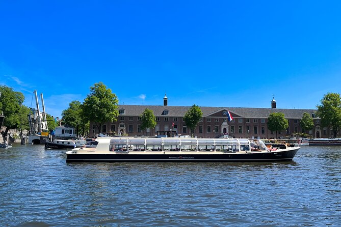Discover Amsterdam: Luxury Canal Cruise with a Local Skipper - Museums, modern buildings, and rooftop views