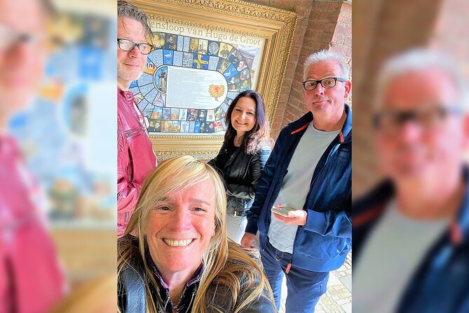 Discover Delft with a self-guided Outside Escape city game tour! - Oude Delft 116 and a bridge by the old church