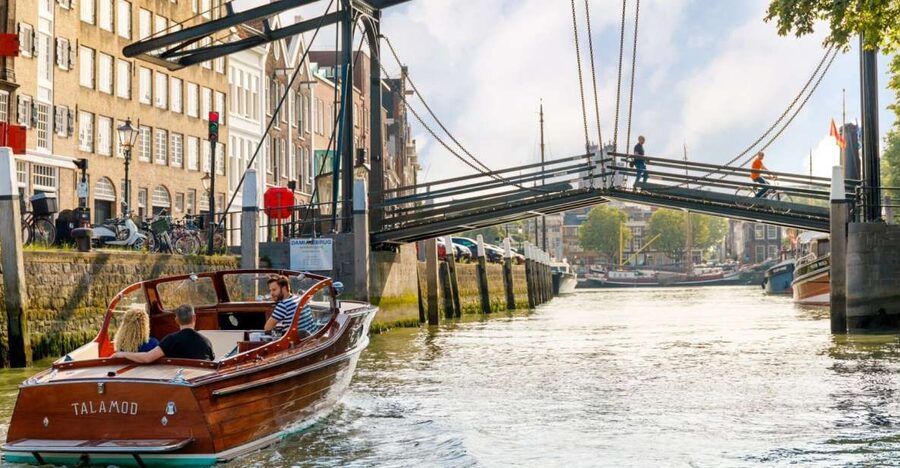 Dordrecht: City Walking Tour with Boat Ride - The historical harbour area shows Dordrecht’s working side