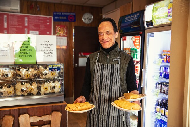 Eating Amsterdam: Albert Cuyp Market & The Pijp Food Tour - Alain Bernard Butchery and the ham selection