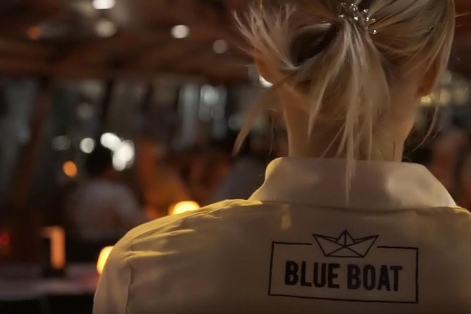Evening Canal Cruise in Amsterdam with Wine & Cheese Option - The audio guide is helpful, but not a live tour
