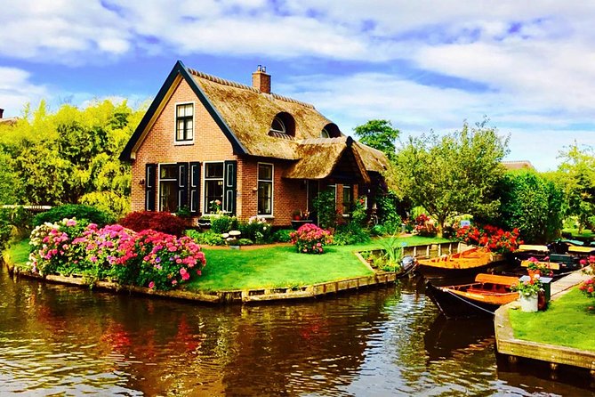 From Amsterdam: Zaanse Schans, Volendam, Giethoorn with Boat Tour - Zaanse Schans, windmills, clogs, and cheese