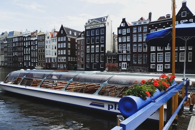 Full-Day Trip From Amsterdam to Keukenhof, Zaanse Schans + Cruise - A five-minute clog demonstration with a long backstory