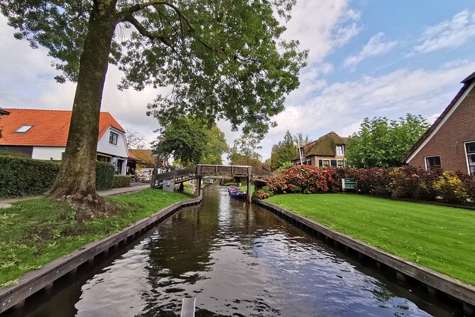 Giethoorn, Afsluitdijk, Zaanse Schans Day Tour Incl Hotel Pick Up - Price, pickup, and timing
