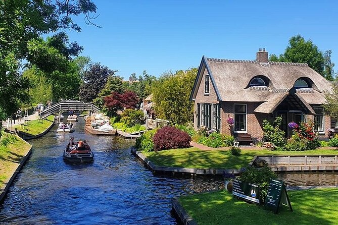 Giethoorn Day Tour from Amsterdam with Small Boat Ride - Reaching the canals and thatched houses