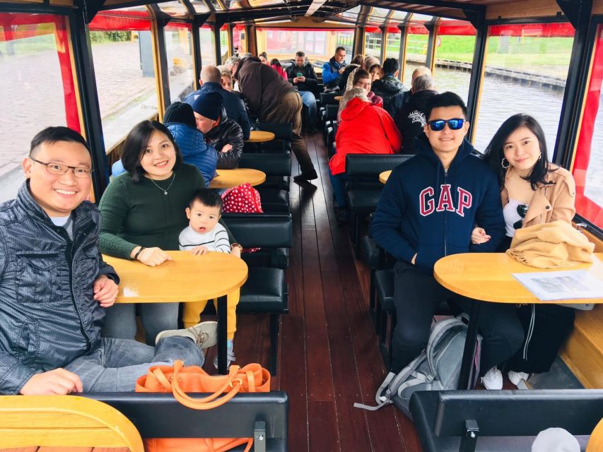 Giethoorn: Private Day Trip with Boat Tour from Amsterdam - Walking through Giethoorn’s waterways and farmhouses