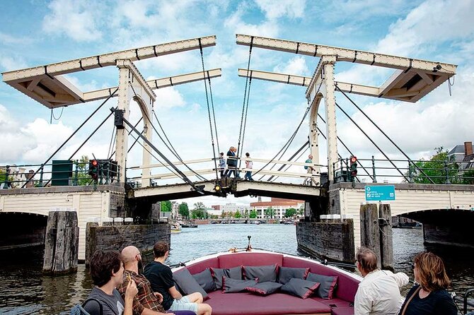 Guided Amsterdam Canal Cruise – Snacks & Drinks on board(1 Hour) - A glimpse of the Hortus Botanicus