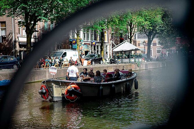 Guided Amsterdam Canal Cruise – Snacks & Drinks on board(1 Hour) - The Seven Bridges view