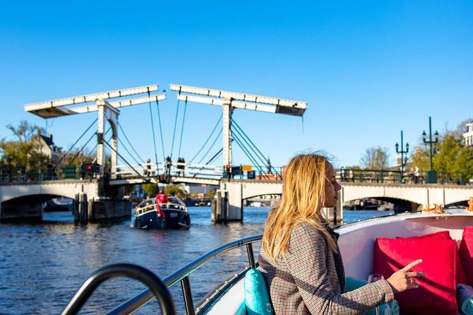 Guided Amsterdam Canal Cruise – Snacks & Drinks on board(1 Hour) - Oude Kerk and the quiet center of the Red Light District