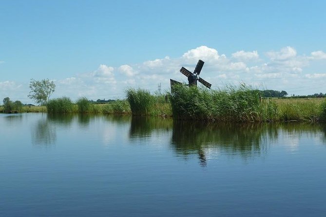 Guided Canoe Adventure with Picnic Lunch in Waterland from Amsterdam - Swimming and weather in the open wetlands
