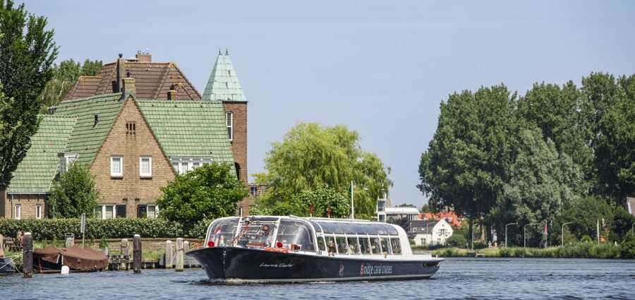 Haarlem: Dutch Windmill & Spaarne River Sightseeing Cruise - Covered comfort, snacks, and the weather question