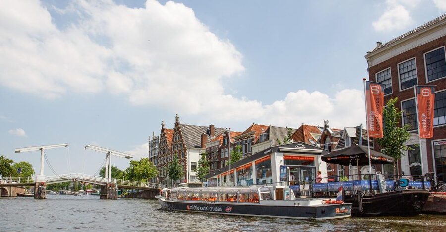 Haarlem: Sightseeing Canal Cruise through the City Center - Boarding across from Teylers Museum