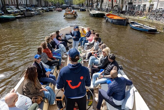 Highlights and Local Insights Canal Cruise Tour in Amsterdam - Finishing beneath Magere Brug