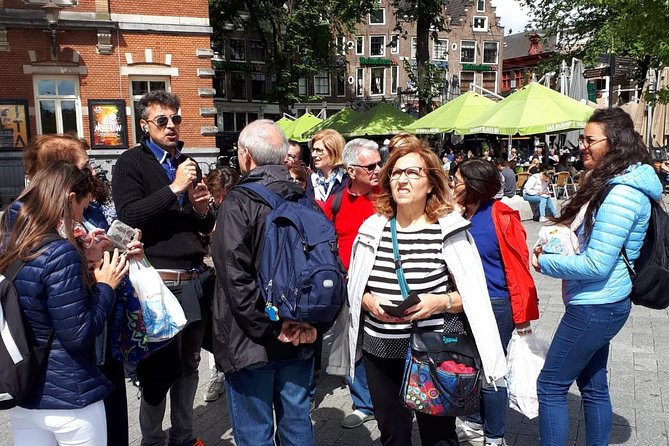 Historical tour of Amsterdam with Italian guide - The Flower Market and a short pause