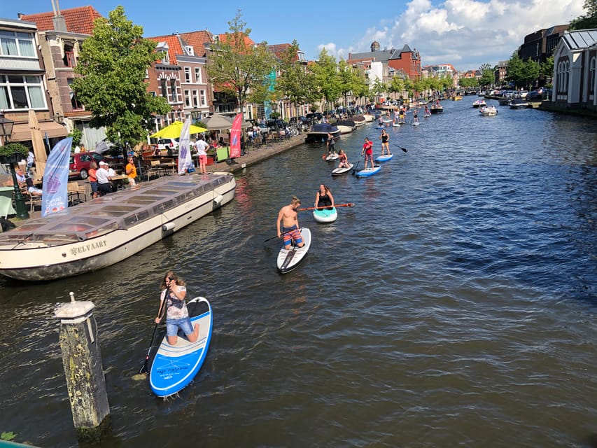 Leiden: Paddleboard Rental to Explore Leiden's Canals - Rembrandt, the Academy Building, and old city markers