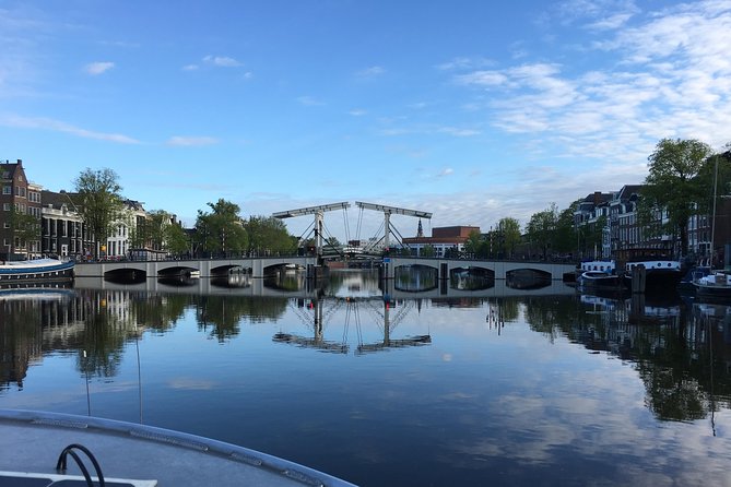 Morning Canal Cruise Amsterdam in Small-Group - Views from the cabin and outer deck