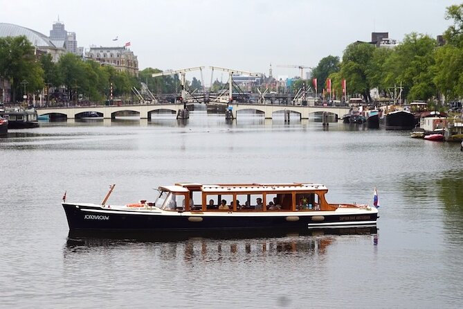 Morning Canal Cruise Amsterdam in Small-Group - Meeting the 1928 saloon boat on Prinsengracht
