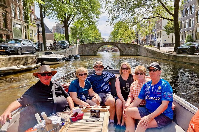 Private 90 Minute Amsterdam Canal Belt Exploration Cruise - From the Amstel to the Dancing Houses