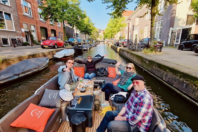 Private 90 Minute Amsterdam Canal Belt Exploration Cruise - A poignant house and the Westerkerk