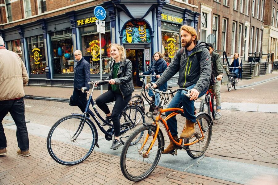 Private Amsterdam Bike Tour with a Local - Skinny Bridge and the canal-side ride