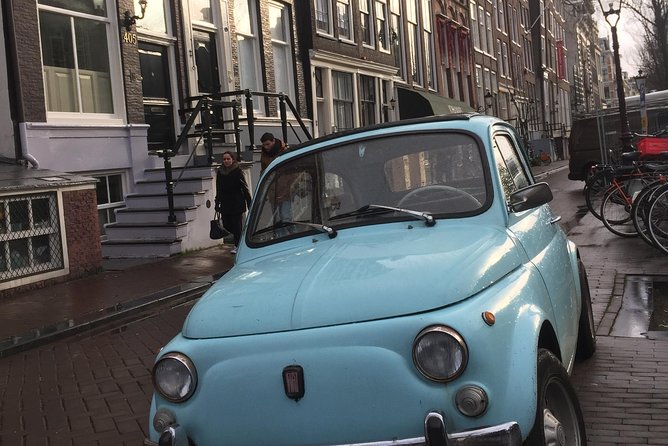 Private Amsterdam Bike Tour with a local guide (also for families) - Cycling under the Rijksmuseum