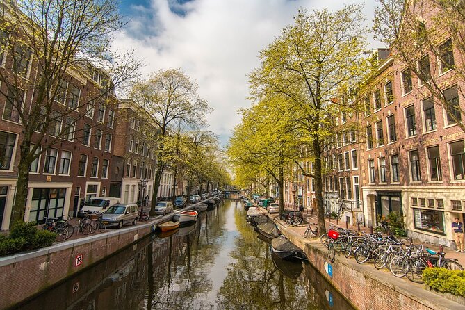 Private Amsterdam City Highlights Bike Tour (PRIVATE GUIDE) - Why a bicycle is the right Amsterdam introduction