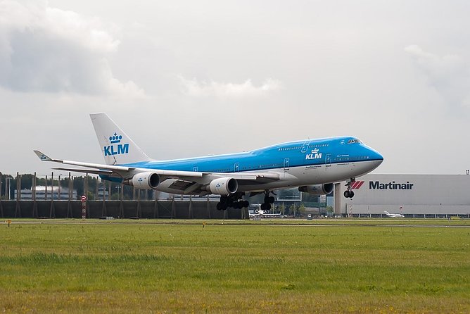 Private Amsterdam Departure Transfer to AMS Schiphol Airport - Leaving Amsterdam without a station scramble