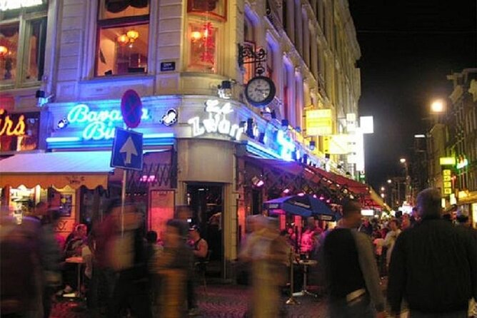 Private Amsterdam Red Light District and Coffee Shop Tour - Starting at Damrak and entering Amsterdam’s Old Town
