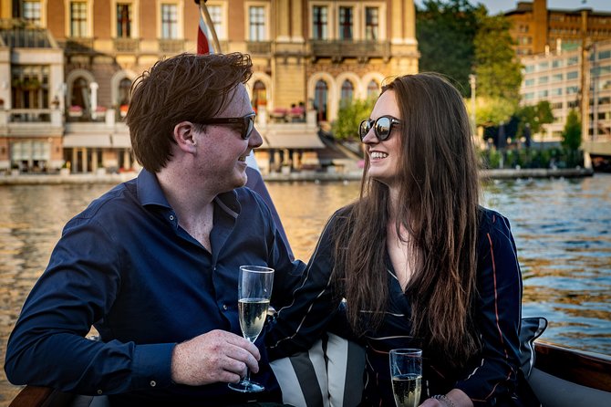 Private Boat Tour Amsterdam - 90 Min incl. welcome drink on historic saloon boat - Nine passing-by sections, not nine shore stops