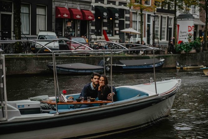 Private Romantic Canal Cruise Amsterdam with Bubbly and Snacks - Heated seats, blankets, and rain protection