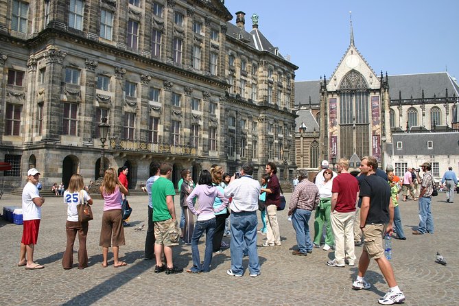 Private Tour: Amsterdam City Walking Tour and Canal Cruise - Dam Square, the Royal Palace, and Amsterdam’s civic center