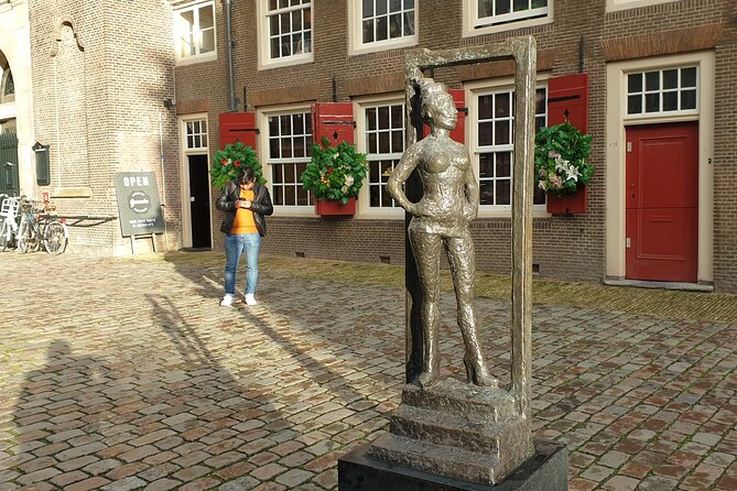 Red Light District Tour by Locals, Small Group (approx 4) - The Old City Gate and Amsterdam’s Earlier Story