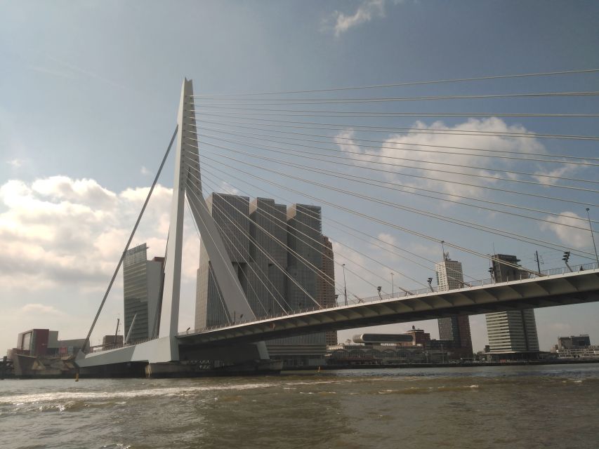 Rotterdam Architecture: Centre and South Bank with watertaxi - Starting under the clock at Rotterdam Central Station