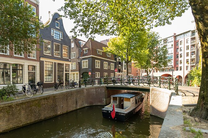 Small Group Boutique All-Inclusive Tour (max 12 p) With Captain - Old defenses, clock towers, and Rembrandt’s Amsterdam