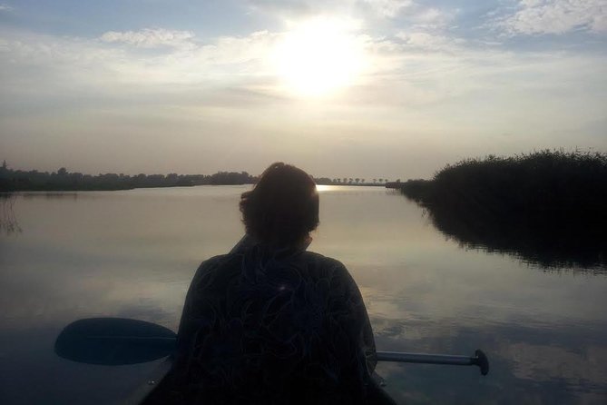 Small-Group Guided Sunset Canoe Tour in Waterland with Dinner - Sunset, swimming, and changing weather